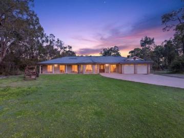 2 Separate Family Homes on Over 5 Acres!