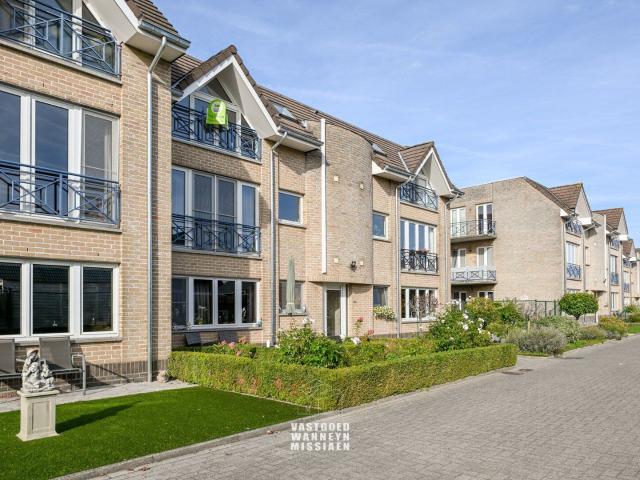 2 slaapkamer appartement met zonnepanelen én autostaanplaat