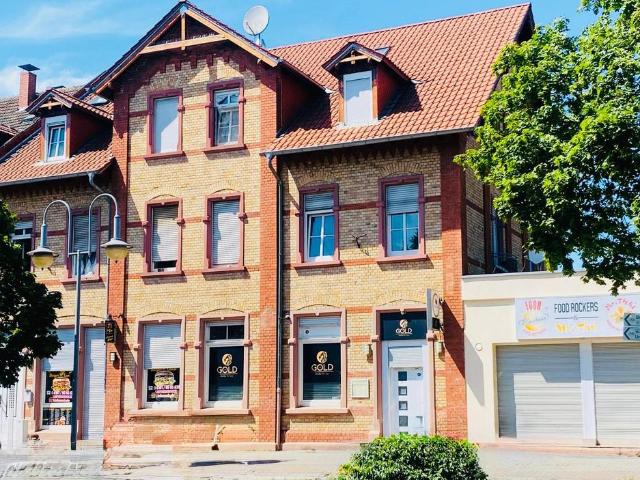 2 Wohnhäuser mit 9 Wohnungen und 3 Gewerbeeinheiten