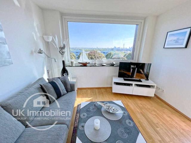2 Zi in moderner Stadtvilla mit direkter Parklage und Skylineblick am Riedberg