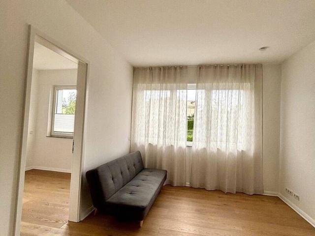 2 Zimmer Wohnung mit Terrasse und Eigengarten