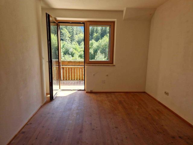2 Zimmer Wohnung mit südseitiger Loggia und Blick ins Grüne und Garage