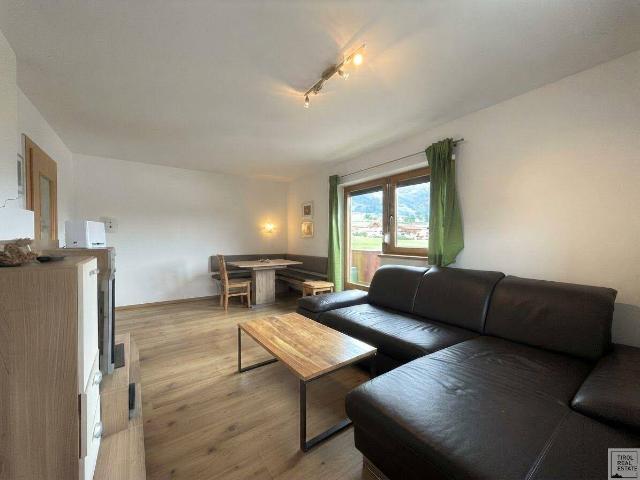 2 Zimmer Wohnung in Uderns kaufen – Balkon, Bergblick & Tiefgarage