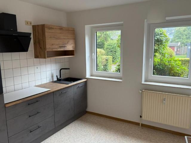 2 Zimmer Erdgeschosswohnung mit kleiner Terrasse, neuer Einbauküche, Kellerraum in Augustfehn/ Ammerland