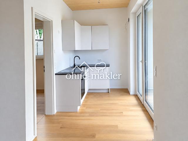 2 Zimmer Erstbezug im Holzmassivhaus – mit Balkon & hochwertige Ausstattung