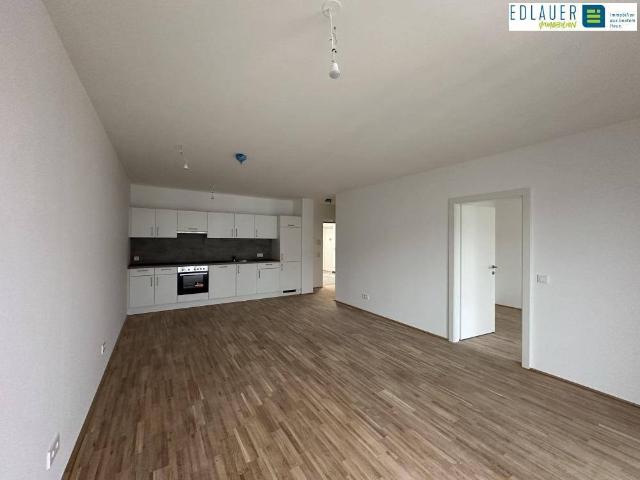 2 Zimmer Neubauwohnung mit Balkon Stadthaus zum Fluss!