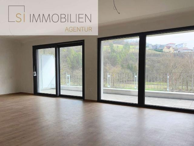 2 ½ Zimmer Neubauwohnung mit Loggia & Tiefgaragenstellplatz
