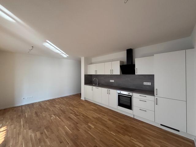 2 Zimmer Neubauwohnung im Erdgeschoss mit Tiefgarage