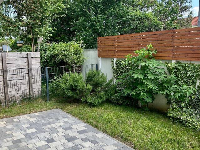 2 Zimmer Neubau mit Garten und E Charger