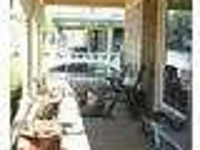 2 3 Bedroom first floor apartment close to Main. Single Car Garage!