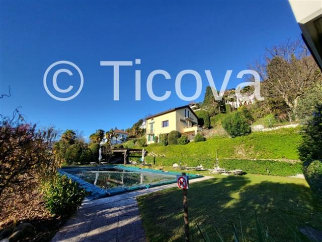 2.5 Zimmer mit Seeblick und Swimmingpool. Privater und raffinierter Kontext