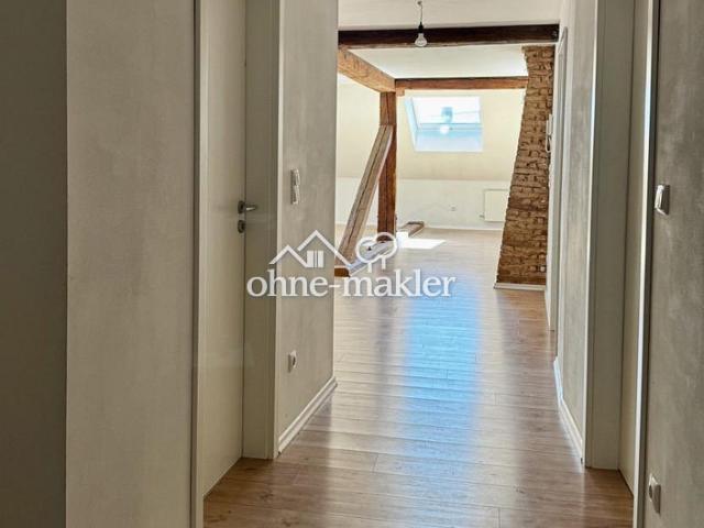 2,5 Zimmer Dachgeschosswohnung mit ca. 100 m²