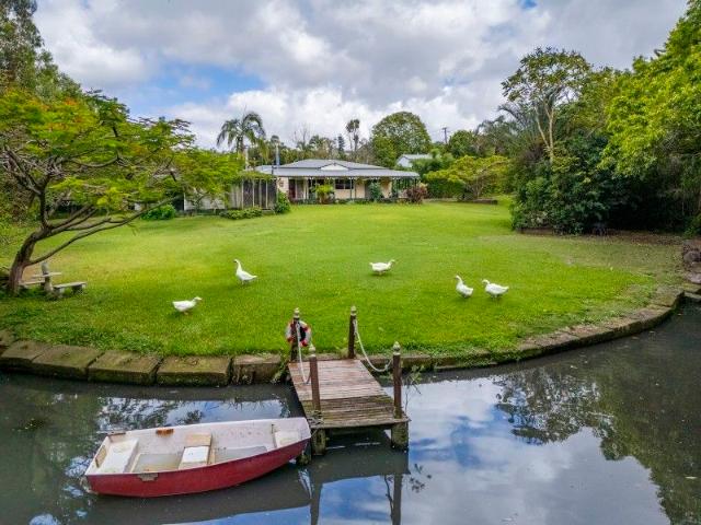 Flood free ~ 2.6 Acres of Country Living with City Convenience.