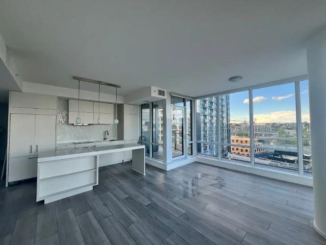 2bed 2bath Condo in East Village with river views and underground parking incl. — 2 Bedrooms+ Den Condo Unit