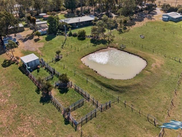 31 Acres A beautifully crafted homestead & breathtaking views