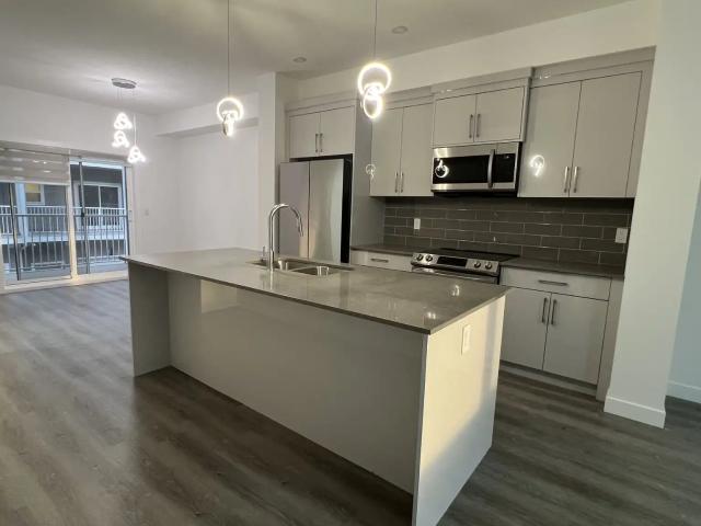 3 Bed Townhome with Garage and Balcony for Rent in Saddle Ridge NE