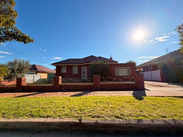 3 Bedroom Brick Home with Large Garage & Workshop