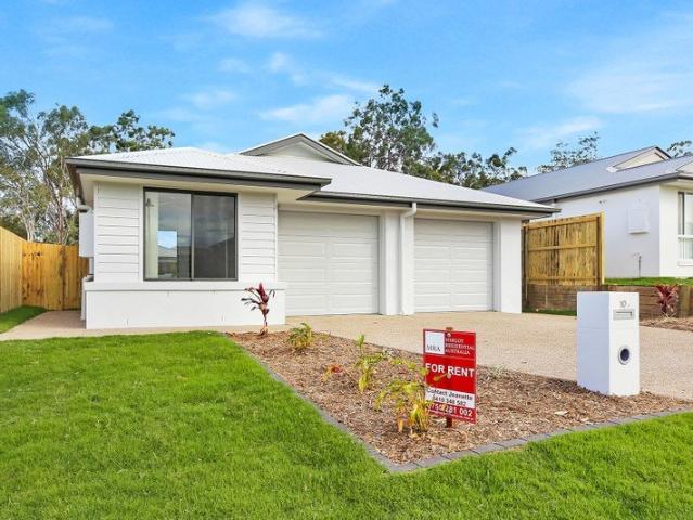 3 BEDROOM DUPLEX WITH OPEN PLAN KITCHEN LIVING DINING AREA. VERY GOOD SIZE BEDROOMS WITH A BACKYARD THAT EASILY FITS A TRAMPOLINE