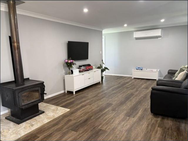 3 Bedroom home with plenty of sheds
