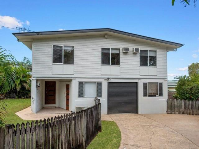 3 BEDROOM HOME IN CRANBROOK + POOL + SOLAR + DOWNSTAIRS UTILITY ROOM WITH A STORAGE ROOM, BATHROOM AND KITCHENETTE!