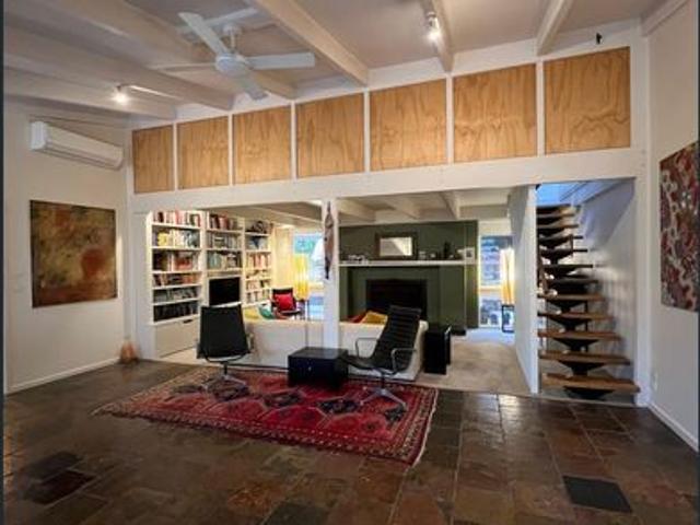 Spacious open plan home in garden setting