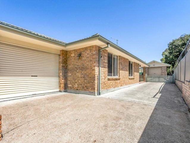 3 bedroom unit with large back yard