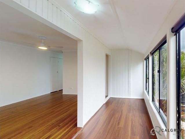 3 Brm, New paint, Sunroom, L Shaped lounge with wood fire, Study area, Rumpus and 2nd bathroom downstairs, Deck,1012m2, Fenced yard. Ocean View