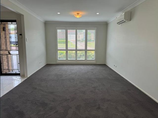 3 Car Garage. Two Living Areas. Covered outdoor entertainment area