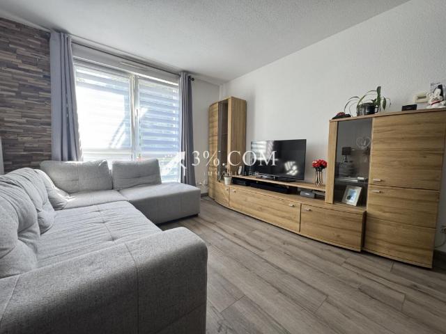 3%.COM Appartement 2 pièces avec balcon, parking et cave