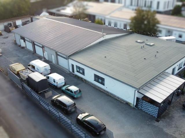 3 Hallen, viele Garagen, 2 Eigentumswohnungen