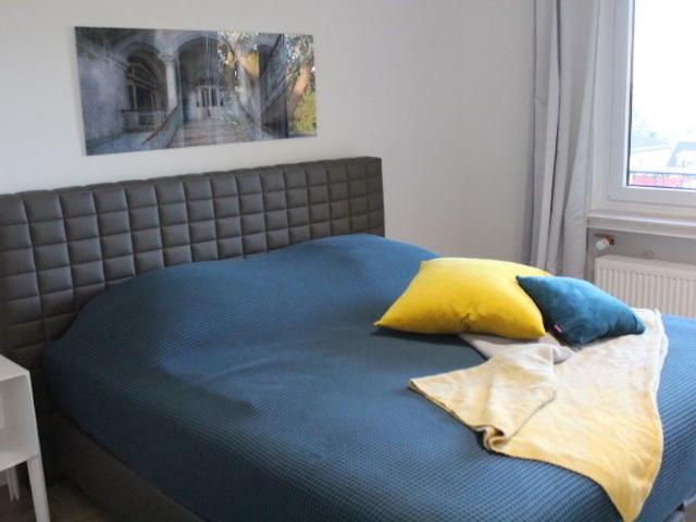 3 rooms with designer furniture and art, with chimney, great balcony, popular location