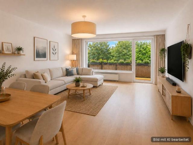 3 Zimmer Wohnung mit Potenzial, eigenem Garagenplatz und großem Balkon mit grünem Ausblick