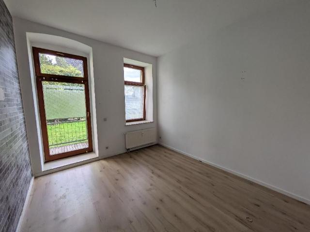 AKTION! 1 Monat Kaltmietfrei ! 3 Zimmer Wohnung im EG mit Balkon & eigenem Eingang – Denkmalobjekt
