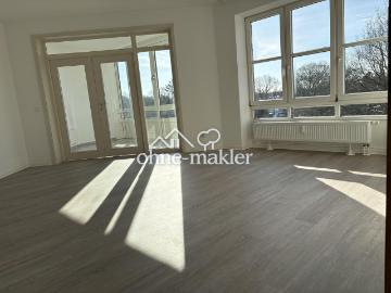 3 Zimmer Endetagen Wohnung mit Südloggia und Tiefgaragen Stellplatz