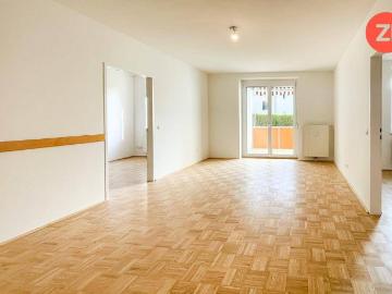 3 Zimmer Erdgeschoss Wohnung inkl. Loggia und Tiefgaragen Parkplatz