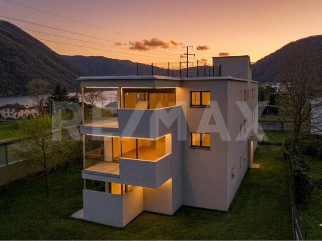 Duplex 3 ½ locali con vista lago e giardino come una casa a Melano