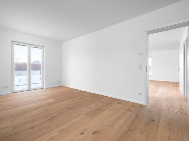3‑Zimmer‑Neubauwohnung mit Balkon und PKW Stellplatz