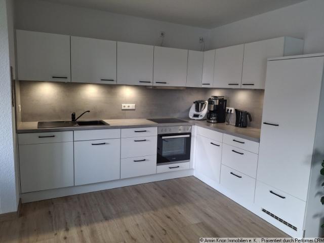 3 Zimmer Obergeschosswohnung mit Balkon, Einbauküche, Aufzug und PKW Stellplatz in Bad Zwischenahn