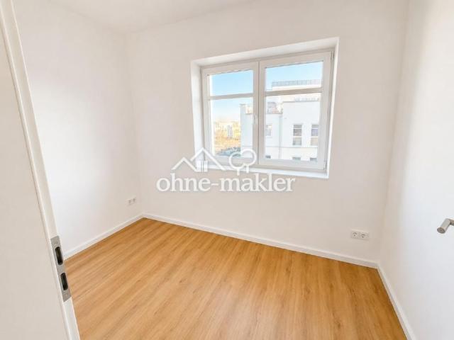 3 Zimmer Oberwohnung mit Balkon im Villen Quartier