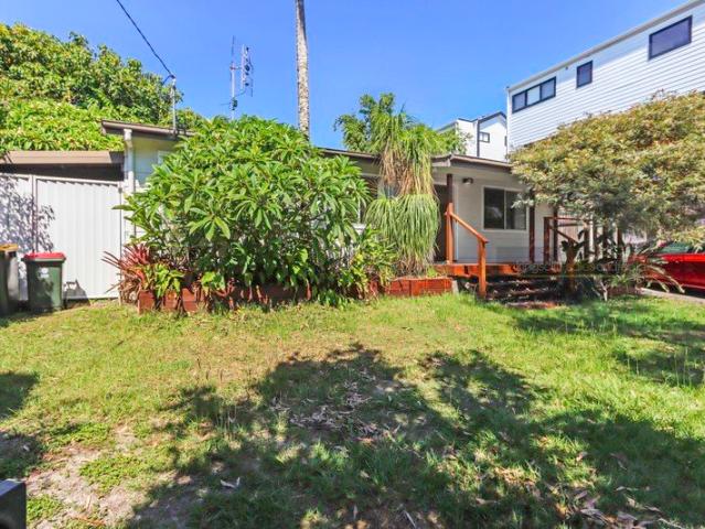 3br freestanding beach cottage with aircon and fenced yard