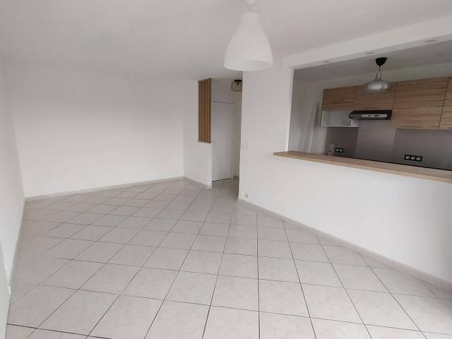 T3 59m² Achères centre ville avec cave, box et balcon