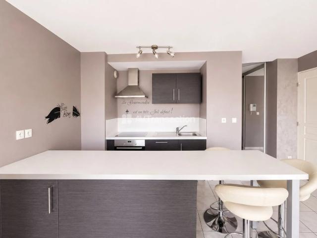 T3 60 m²– Balcon, climatisation, grand garage –Résidence récente
