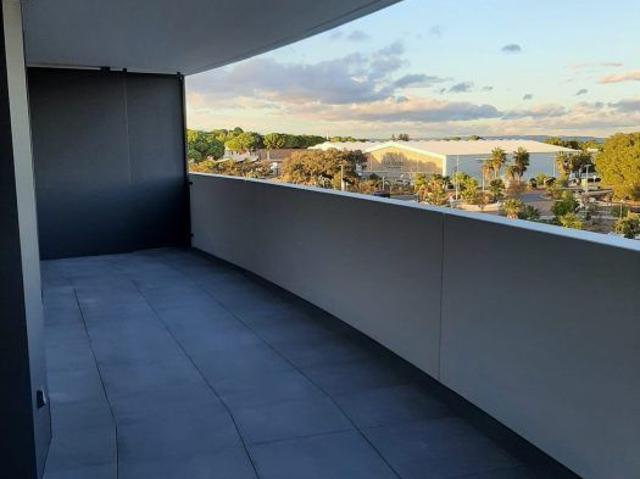 T3 AVEC BALCON ET UN PARKING EN SOUS SOL