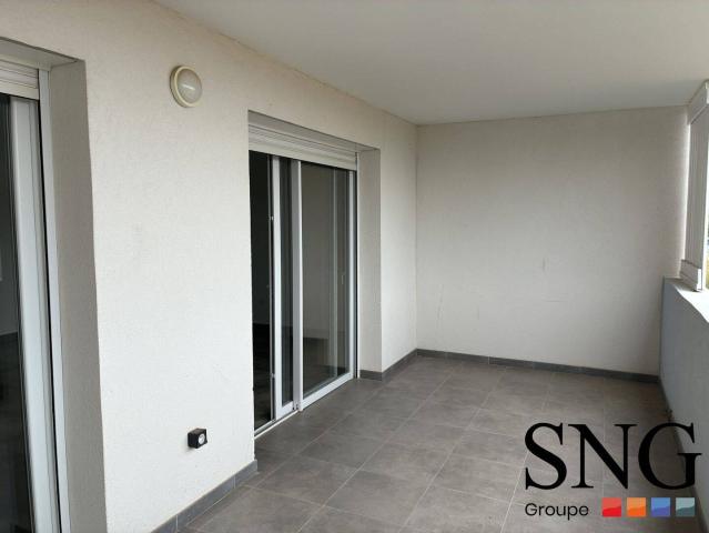 T3 AVEC BALCON ET DEUX PARKINGS