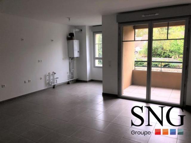 T3 AVEC LOGGIA + 2 PARKINGS EN SOUS SOL