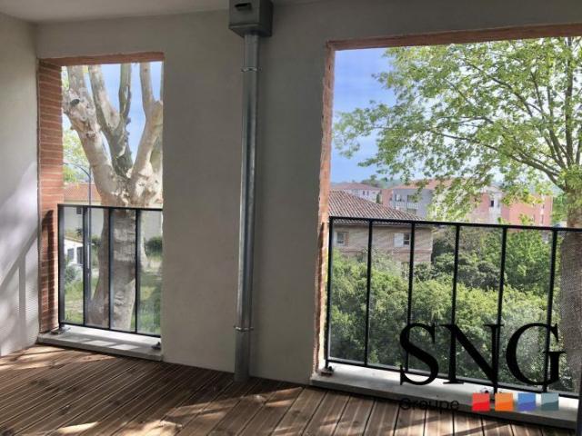 T3 AVEC LOGGIA ET PARKINGS
