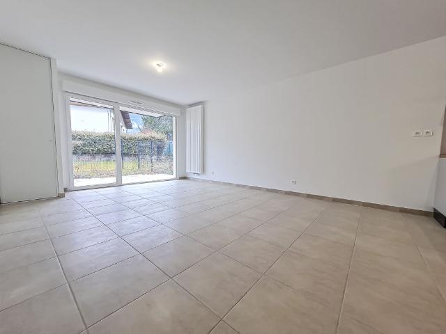 T3 DE 65.9 M² A LOUER TERRRASSE + JARDIN + PLACE DE PARKING EN S/SOL NOUVELLE RESIDENCE A MARNAZ