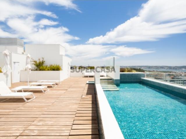 T3 de Luxo no Lotus Living com Vista Rio, Terraço, Piscina e 2 Estacionamentos