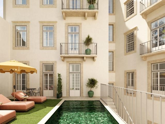 Apartamento elegante com varanda voltada para pátio interior na histórica Baixa
