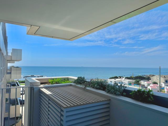 T1 em Primeira Linha de Mar